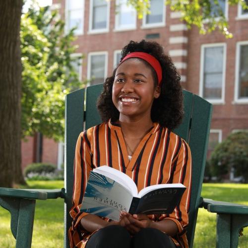 Student in chair outside 